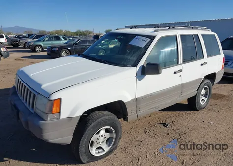 1997 Jeep Grand Cherokee Laredo/Tsi из США, поврежденный, VIN 1J4GZ58S0VC771193